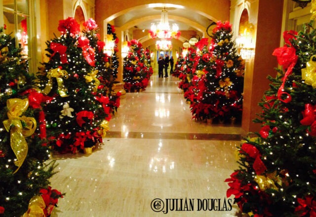 A view down the long hallway donned in Christmas fare.