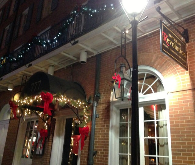 Restaurant R'evolution's Bienville Street entrance, all decked forthe Holidays (photo courtesy of Restaurant R'evolution).