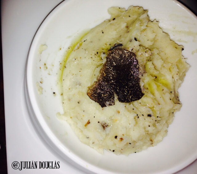The Truffle Mashed Potatoes my wife ordered... and the pitcure doesn't truly show the size of those truffle shavings !!!